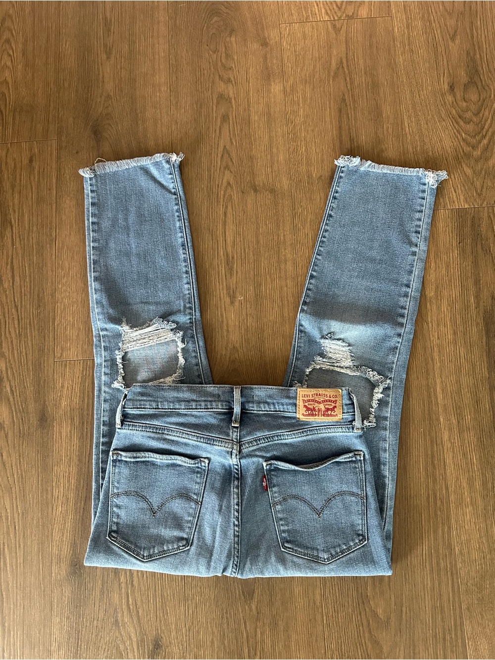 Levi's Light Blue Ripped Cropped Jeans
